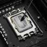 Conductonaut Extreme liquid metal being spread across a processor with a cotton swab