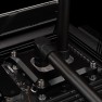 Black DeltaMate 7mm male to male extender joining a 90 degree rotary fitting to a CPU water block