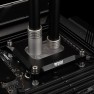 Matte nickel DeltaMate 28mm male to female extender raising a compression fitting on a CPU water block