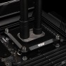 Black DeltaMate 28mm male to female extender raising a compression fitting on a CPU water block