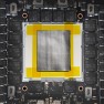 KryoSheet graphene thermal sheet on a graphics card chip, framed with yellow tape