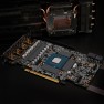 Minus Pad Pro thermal pads placed around the graphics chip on a graphics card, with the cooler lifted off