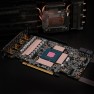 Minus Pad 8 thermal pads placed around the graphics chip on a graphics card, with the cooler lifted off