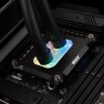 Intel 1851 Mycro Pro RGB CPU water block installed on a motherboard with two tubes connected and the lighting on